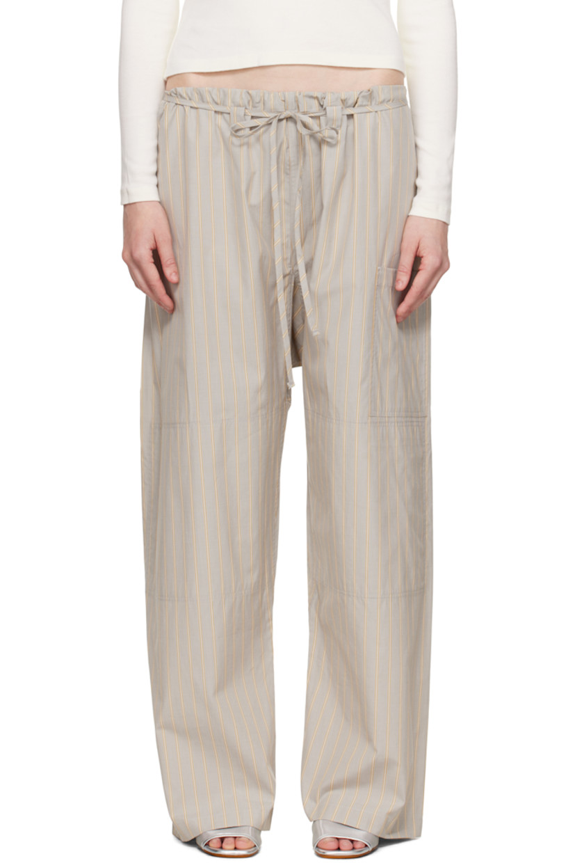 Cotton poplin lounge pants. Stripes throughout.

· Paneled construction
· Drawstring at waistband
· Belt loops at front
· Patch pocket at leg and back
· Cutout at sides

Supplier color: Grey stripe