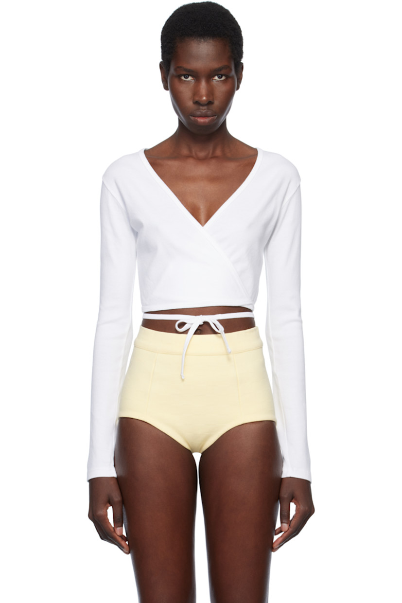 Cotton ribbed jersey top. 

· Wrap construction
· Plunging V-neck
· Self-tie fastening at cropped hem

Supplier color: White