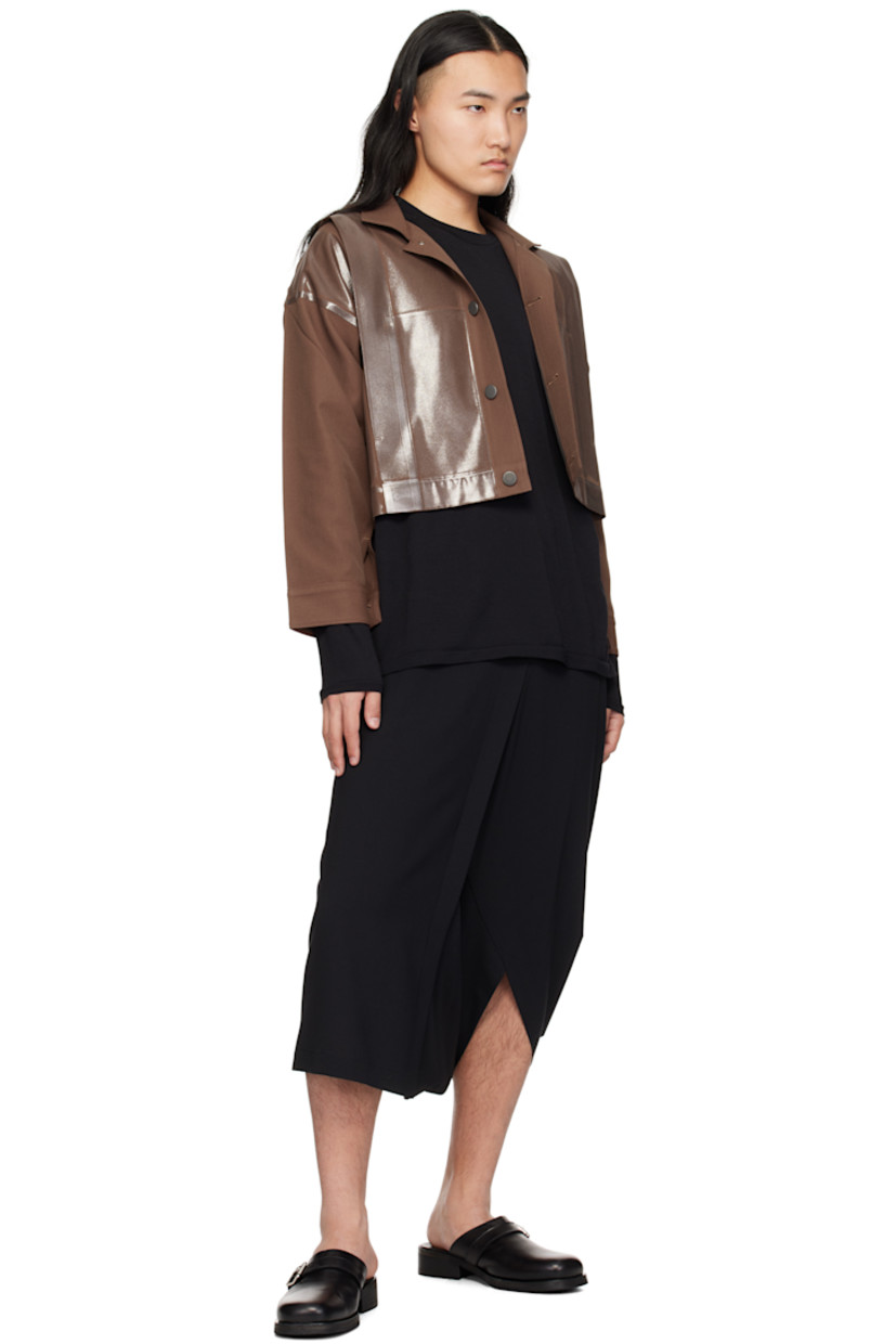 Foiled-coated polyester- and cotton-blend twill jacket. 

· Spread collar 
· Button closure
· Tucks at front and back
· Seam pockets
· Dropped shoulders 
· Single-button barrel cuffs
· Unlined

Supplier color: Brown