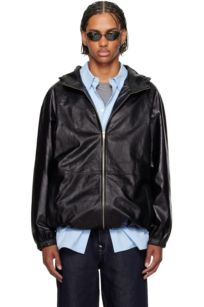 Grained calfskin jacket.

· Bungee-style drawstring at hood and hem
· Zip closure
· Zip pockets
· Raglan sleeves
· Elasticized cuffs
· Logo embossed at back
· Welt pockets at interior
· Full satin lining

Supplier color: Black