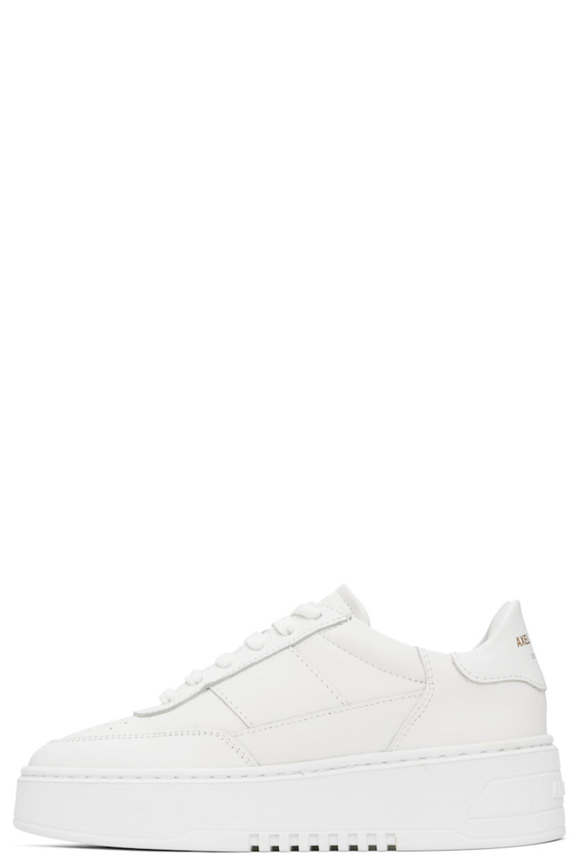 Handcrafted low-top LWG-certified buffed leather sneakers in white.

· Perforations at toe
· Lace-up closure
· Padded tongue and collar 
· Logo stamp at outer side and heel tab 
· Buffed leather and faux-suede lining
· Logo embossed at platform rubber midsole
· Treaded rubber sole
· Platform: H1.75"

Supplier color: White/White