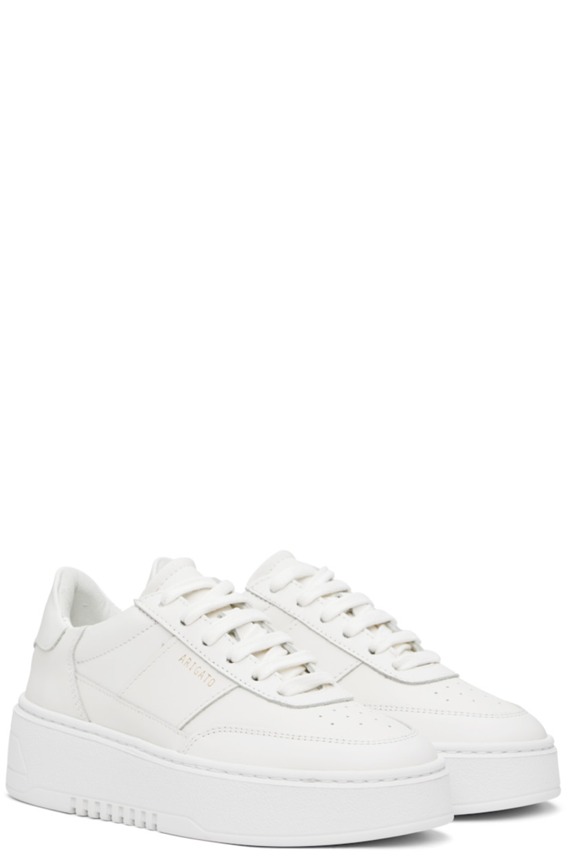 Handcrafted low-top LWG-certified buffed leather sneakers in white.

· Perforations at toe
· Lace-up closure
· Padded tongue and collar 
· Logo stamp at outer side and heel tab 
· Buffed leather and faux-suede lining
· Logo embossed at platform rubber midsole
· Treaded rubber sole
· Platform: H1.75"

Supplier color: White/White