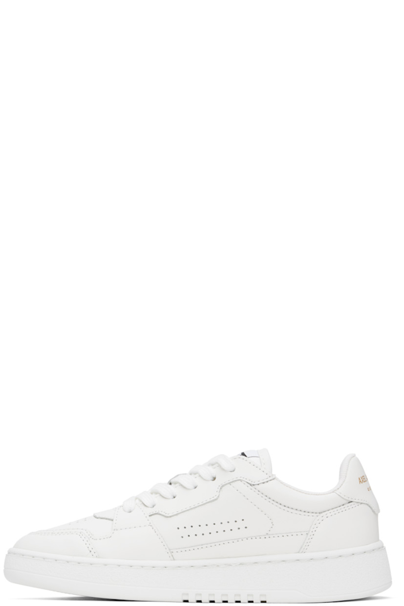 Handcrafted low-top buffed leather sneakers in white.

· Perforations at toe and sides
· Lace-up closure
· Logo patch at padded canvas tongue
· Padded collar
· Logo stamp at outer side and heel tab
· Recycled mesh and faux-suede lining
· Logo embossed at textured rubber midsole
· Treaded rubber sole

Supplier color: White/White