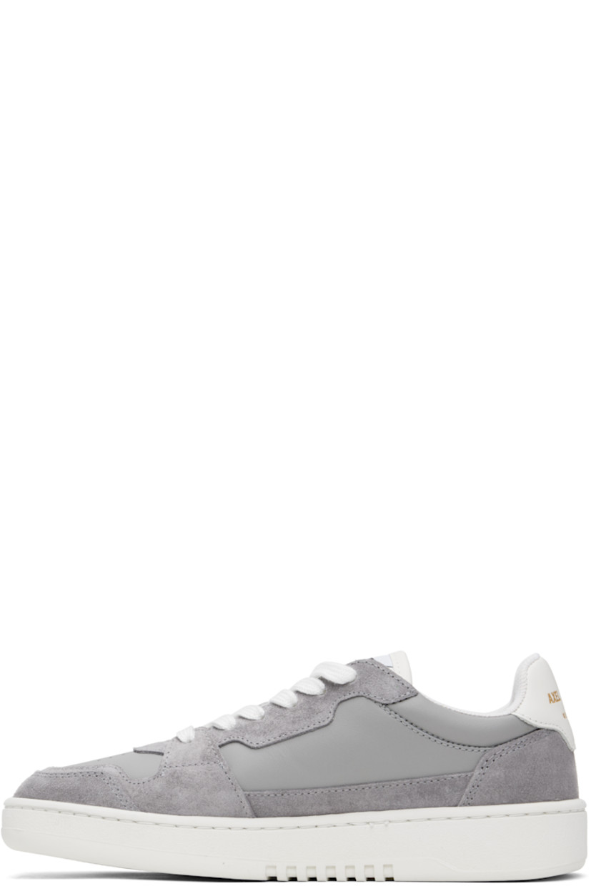 Handcrafted low-top buffed leather and suede sneakers in gray.

· Perforations at toe
· Lace-up closure
· Logo patch at SEAQUAL® YARN recycled canvas tongue
· Padded tongue and collar 
· Logo embossed at outer side and heel tab 
· Embroidered graphic  at outer side 
· Mesh and faux-suede lining
· Logo embossed at rubber midsole
· Treaded rubber sole

Supplier color: Grey/White