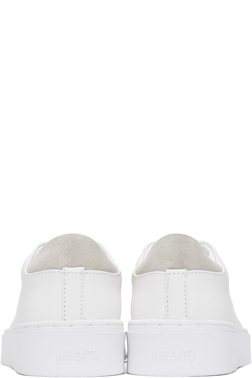 Handcrafted low-top LWG-certified buffed leather sneakers in white.

· Lace-up closure
· Logo stamp at padded tongue
· Padded collar
· Logo stamp at outer side
· Perforations at sides
· Suede trim at heel tab
· Buffed leather and faux-suede lining
· Logo embossed at rubber midsole
· Treaded rubber sole

Supplier color: White/Taupe