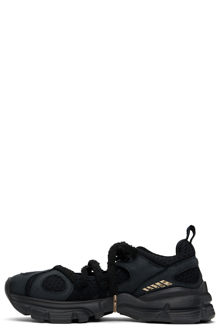 Low-top textured woven recycled polyester Mary Jane-style sneakers in black.

· Handcrafted
· Cracked leather trim throughout
· Lace-up closure
· Padded collar
· Logo-embroidered pull-loop at heel collar
· Gold-tone stamp at sides
· Recycled jersey lining
· Logo embossed at midsole
· Treaded rubber sole

Supplier color: Black/Black