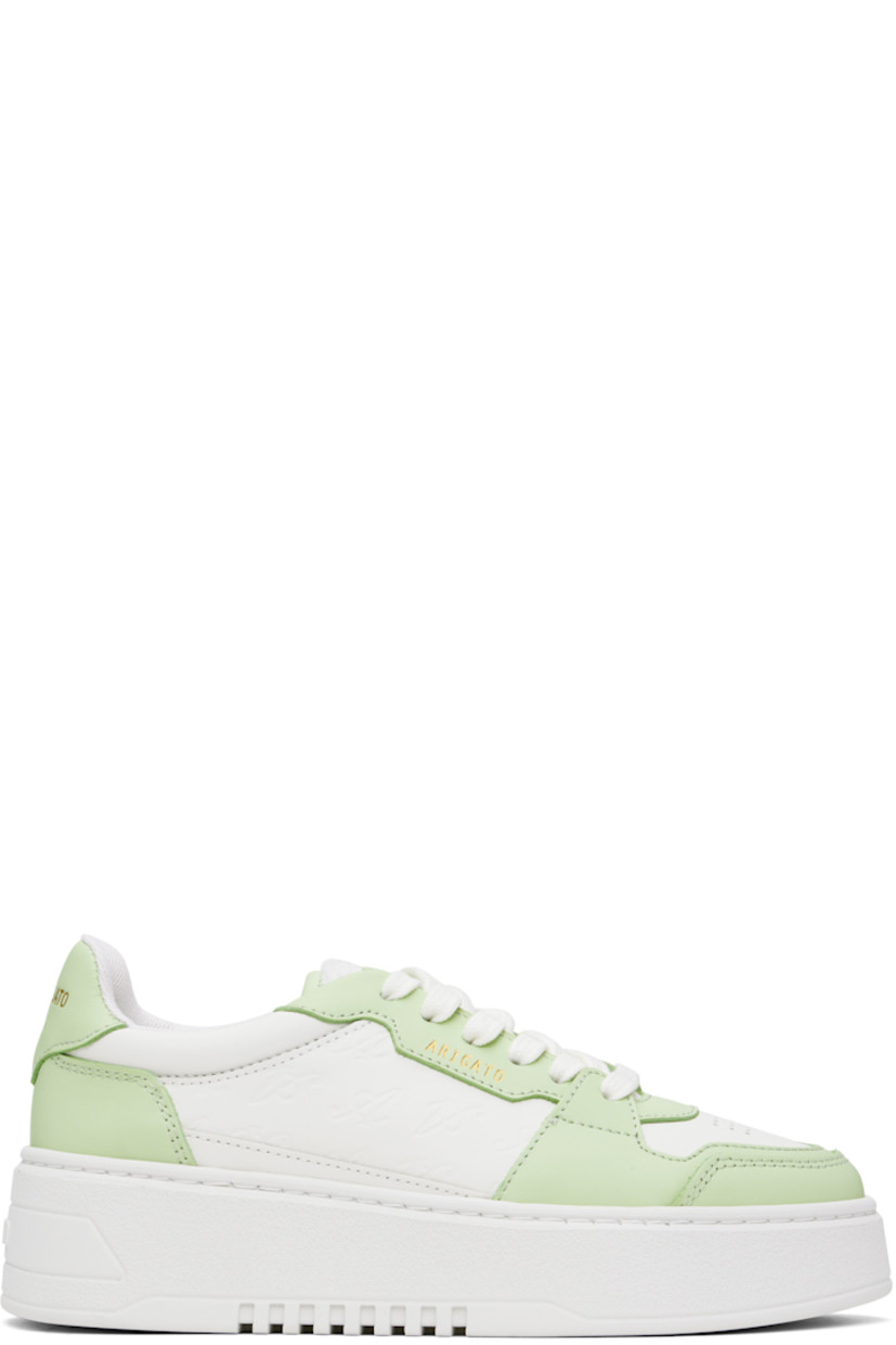 Handcrafted low-top buffed leather sneakers in white and green.

· Perforations at toe
· Lace-up closure
· Bouclé logo patch at padded canvas tongue
· Padded collar
· Logo stamp at outer side
· Logos embossed at sides and heel tab 
· Mesh and suede lining
· Logo embossed at platform rubber midsole
· Treaded rubber sole
· Platform: H2"

Supplier color: White/Light green