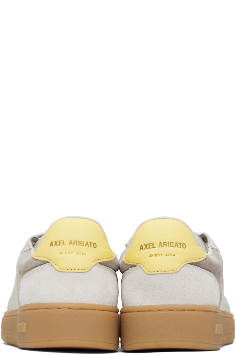 Handcrafted low-top grained leather and suede sneakers in gray.

· Lace-up closure
· Logo patch at padded canvas tongue
· Padded collar
· Perforations at sides
· Logo stamp at outer side and heel tab 
· Mesh and faux-suede lining
· Logo embossed at textured rubber midsole
· Treaded rubber sole

Supplier color: Beige/Gum