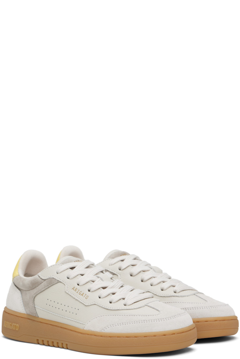 Handcrafted low-top grained leather and suede sneakers in gray.

· Lace-up closure
· Logo patch at padded canvas tongue
· Padded collar
· Perforations at sides
· Logo stamp at outer side and heel tab 
· Mesh and faux-suede lining
· Logo embossed at textured rubber midsole
· Treaded rubber sole

Supplier color: Beige/Gum
