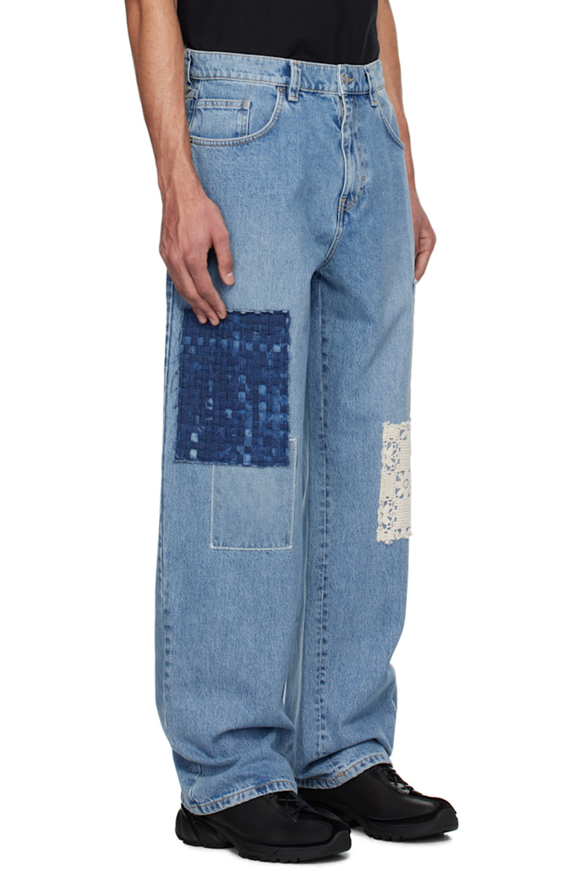 Relaxed-fit non-stretch denim jeans. Fading and reinforced patches throughout. 

· Belt loops
· Five-pocket styling
· Zip fly
· Logo patch at back waistband
· Topstitched logo at back pocket
· Contrast stitching in yellow

Supplier color: Light blue