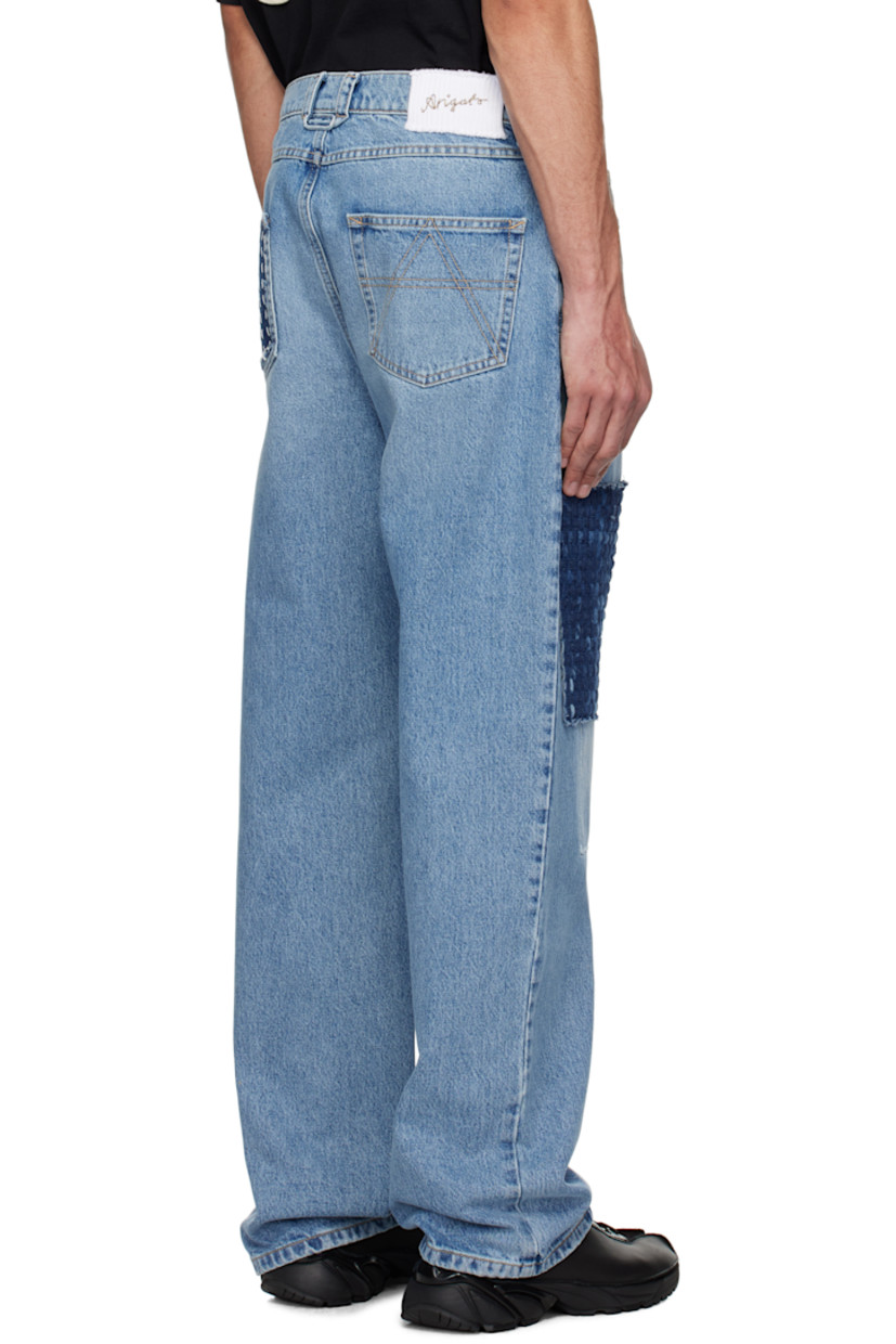Relaxed-fit non-stretch denim jeans. Fading and reinforced patches throughout. 

· Belt loops
· Five-pocket styling
· Zip fly
· Logo patch at back waistband
· Topstitched logo at back pocket
· Contrast stitching in yellow

Supplier color: Light blue