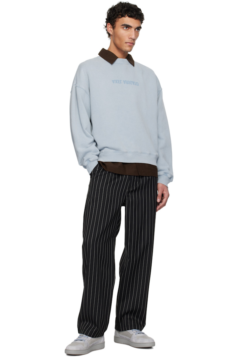 Organic cotton French terry sweatshirt. Fading throughout.

· Rib-knit crewneck, hem, and cuffs
· Logo printed at chest
· Dropped shoulders

Supplier color: Steel blue