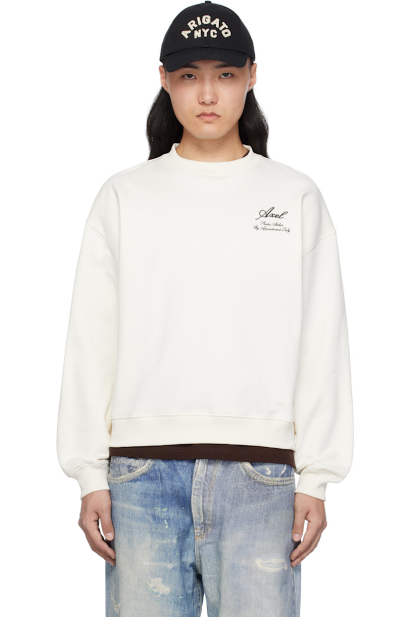 Organic cotton French terry sweatshirt.

· Relaxed-fit
· Rib-knit crewneck, hem, and cuffs
· Logo and text embroidered at chest
· Dropped shoulders

Supplier color: Off-white