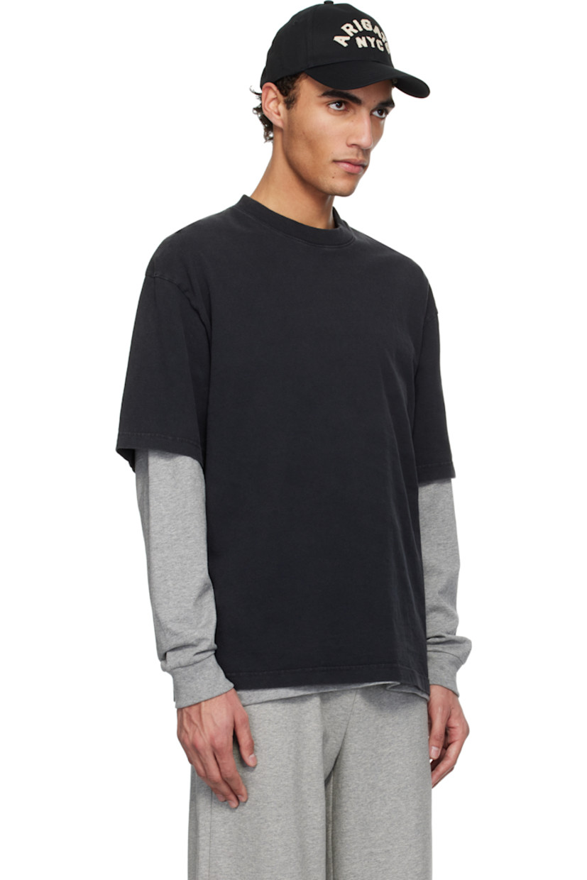Organic cotton jersey T-shirt. Fading throughout.

· Rib-knit crewneck
· Dropped shoulders
· Logo patch at back collar

Supplier color: Black