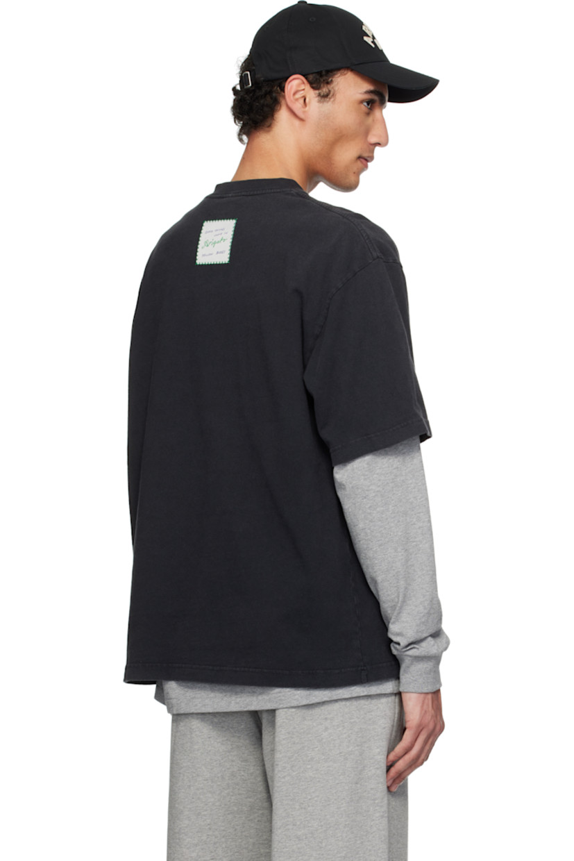 Organic cotton jersey T-shirt. Fading throughout.

· Rib-knit crewneck
· Dropped shoulders
· Logo patch at back collar

Supplier color: Black