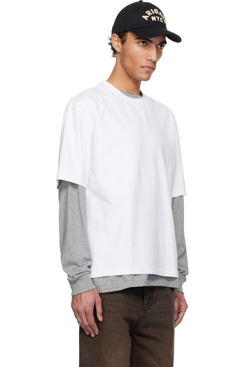 Organic cotton jersey T-shirt.

· Rib-knit crewneck
· Dropped shoulders
· Logo and text appliqués at back

Supplier color: White