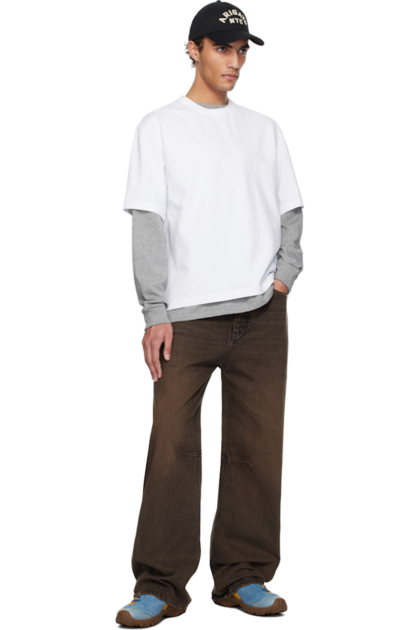 Organic cotton jersey T-shirt.

· Rib-knit crewneck
· Dropped shoulders
· Logo and text appliqués at back

Supplier color: White