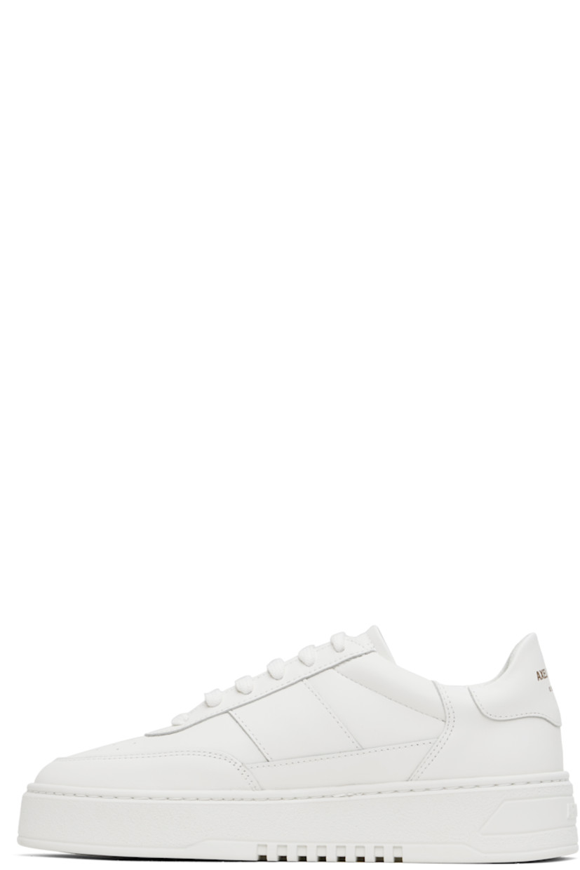 Handcrafted low-top LWG-certified buffed leather sneakers in white.

· Perforated detailing at toe
· Lace-up closure
· Padded tongue and collar
· Logo stamp at outer side and heel tab
· Buffed leather, recycled mesh, and microfiber lining
· Logo embossed at crêpe rubber midsole
· Treaded rubber sole

Supplier color: White/White