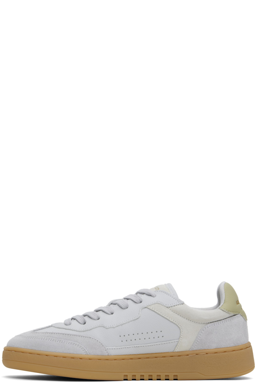 Handcrafted low-top grained leather and suede sneakers in gray. 

· Lace-up closure
· Logo patch at padded tongue
· Padded collar
· Perforated detailing at sides
· Logo stamp at outer side and heel tab
· Recycled mesh lining
· Logo embossed at midsole
· Treaded rubber sole

Supplier color: Light grey/gum