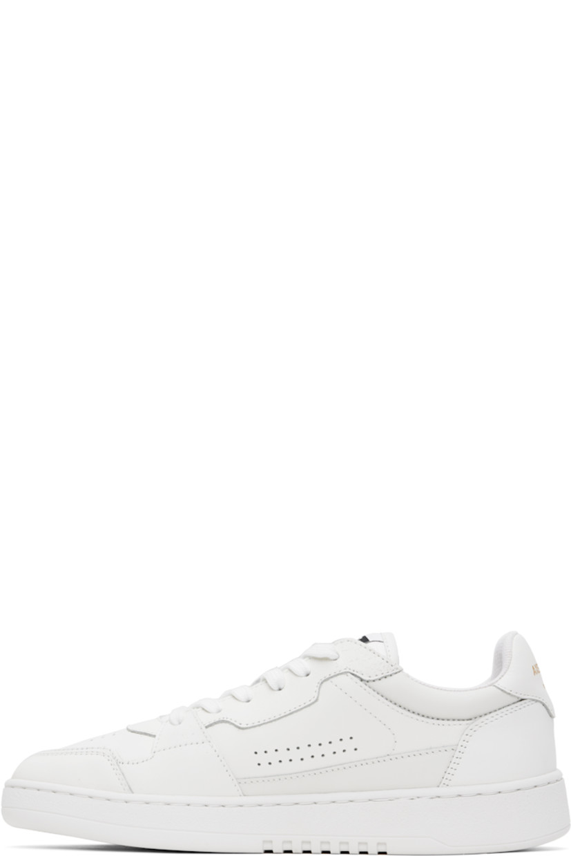 Handcrafted low-top buffed leather and recycled canvas sneakers in white.

· Perforated detailing throughout
· Lace-up closure
· Logo patch at padded tongue
· Padded collar
· Logo stamp at outer side and heel tab
· Recycled mesh lining
· Logo embossed at crêpe rubber midsole
· Treaded rubber sole

Supplier color: White/White