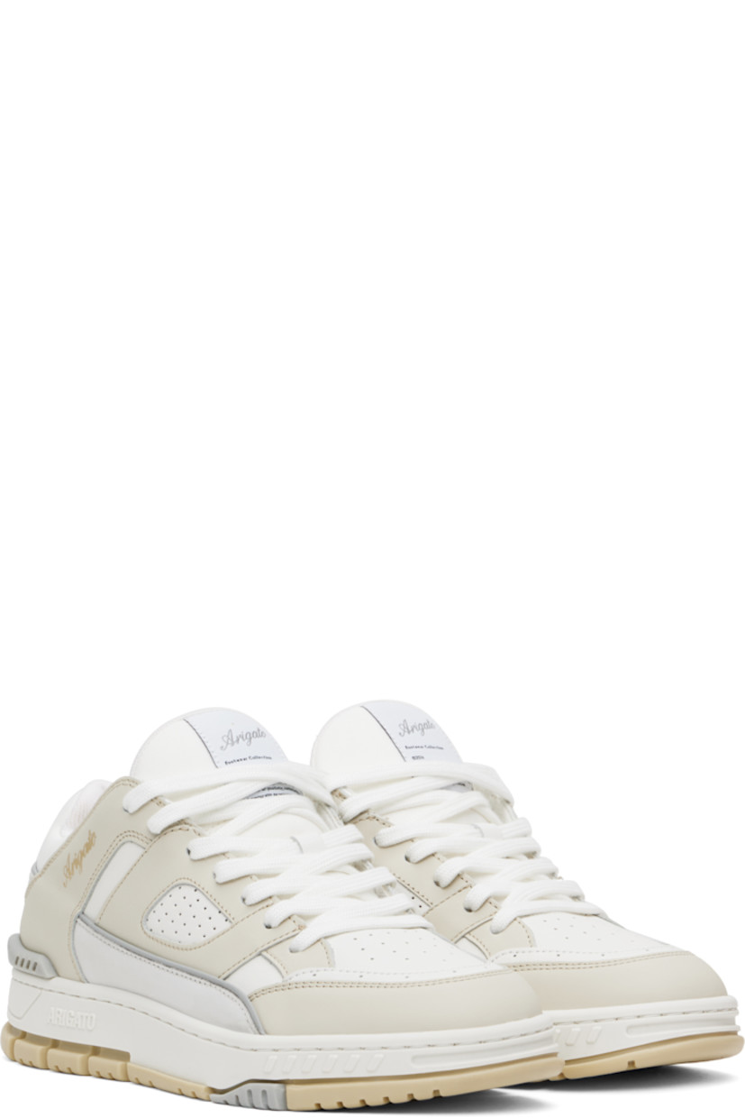 Low-top LWG-certified buffed leather and recycled polyester canvas sneakers in white and beige.

· Handcrafted
· Perforated detailing throughout
· Lace-up closure
· Logo patch at padded tongue
· Padded collar
· Logo stamp at outer side
· Rubber trim at heel counter
· Removable cushioned footbed
· Recycled mesh lining
· Logo embossed at midsole
· Treaded rubber sole

Supplier color: Cremino/White