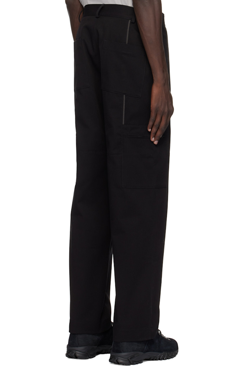 Stretch cotton twill cargo pants. Piping throughout. 

· Paneled construction
· Belt loops at partially elasticized waistband
· Two-pocket styling
· Zip-fly 
· Zip pocket at outseams

Available exclusively at SSENSE.

Supplier color: Black