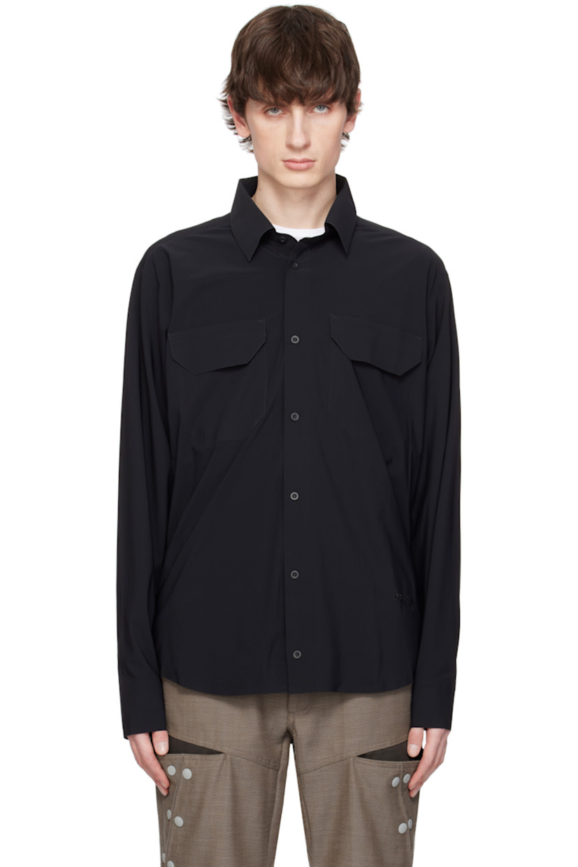 Stretch nylon jersey shirt. Laser-cut raw edges and taped seams throughout.

· Spread collar
· Button closure 
· Flap pockets at chest
· Logo embroidered at shirttail hem
· Barrel cuffs
· Twin pleats at back yoke

Supplier color: Black