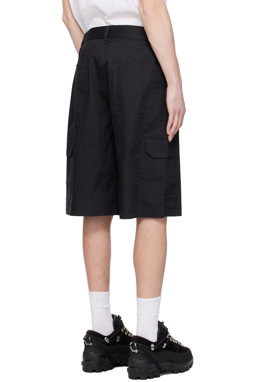 Cotton poplin shorts.

· Belt loops
· Elasticized waistband
· Four-pocket styling
· Zip fly
· Cargo pocket at outseams

Supplier color: Off black