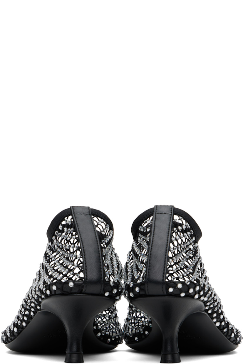 Sheer mesh heels in black.

· Crystal-cut accents throughout
· Square toe
· Elasticized collar
· Covered kitten heel with rubber injection
· Leather sole
· Heel: H1.75"

Supplier color: Black