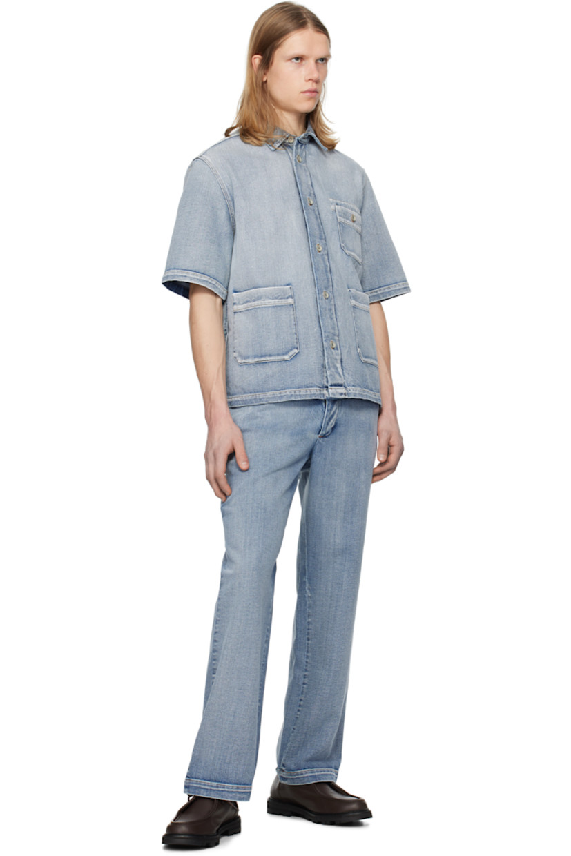 Wide-leg non-stretch denim jeans. Hand-brushed bleaching throughout.

· Mid-rise
· Belt loops
· Five-pocket styling
· Button-fly
· Oxidized silver-tone hardware
· Contrast stitching in tan

Supplier color: Mirage