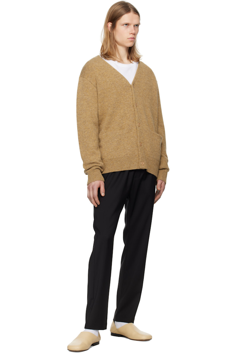 Tropical wool barathea trousers.

· Concealed drawstring at elasticized waistband
· Four-pocket styling
· Mock-fly

Supplier color: Nero