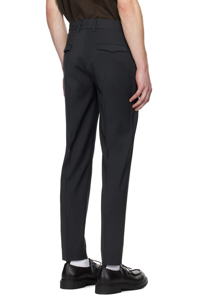 Tropical wool barathea trousers.

· Belt loops
· Four-pocket styling
· Zip-fly
· Creased legs

Supplier color: Piombo