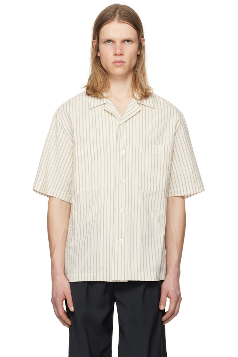 Crinkled cotton poplin shirt. Stripes throughout.

· Open spread collar
· Button closure
· Patch pockets

Supplier color: Avorio