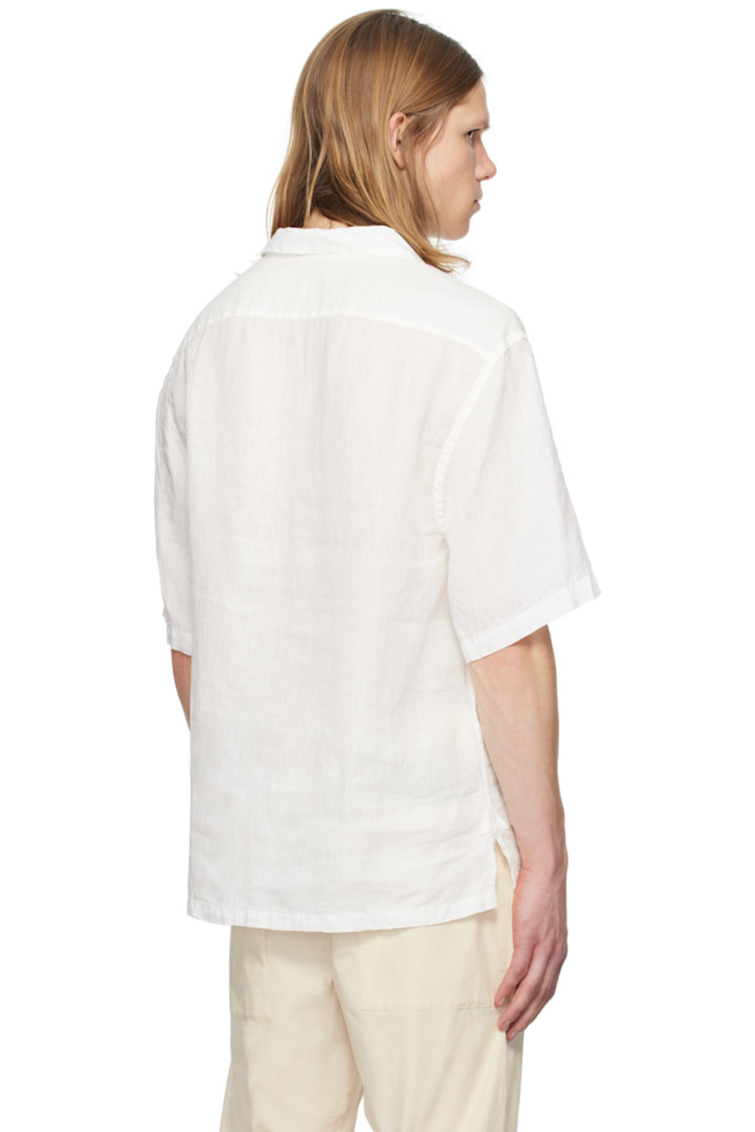 Linen domette polo.

· Spread collar
· Three-button placket
· Tennis-tail hem

Supplier color: Bianco