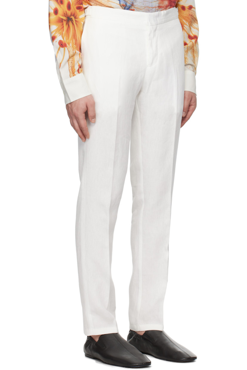 Tapered linen hopsack trousers. Moisture-wicking.

· Three-pocket styling
· Zip-fly
· Creased legs
· Cinch strap at waistband outseams

Supplier color: White sand