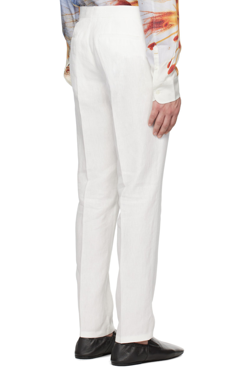 Tapered linen hopsack trousers. Moisture-wicking.

· Three-pocket styling
· Zip-fly
· Creased legs
· Cinch strap at waistband outseams

Supplier color: White sand