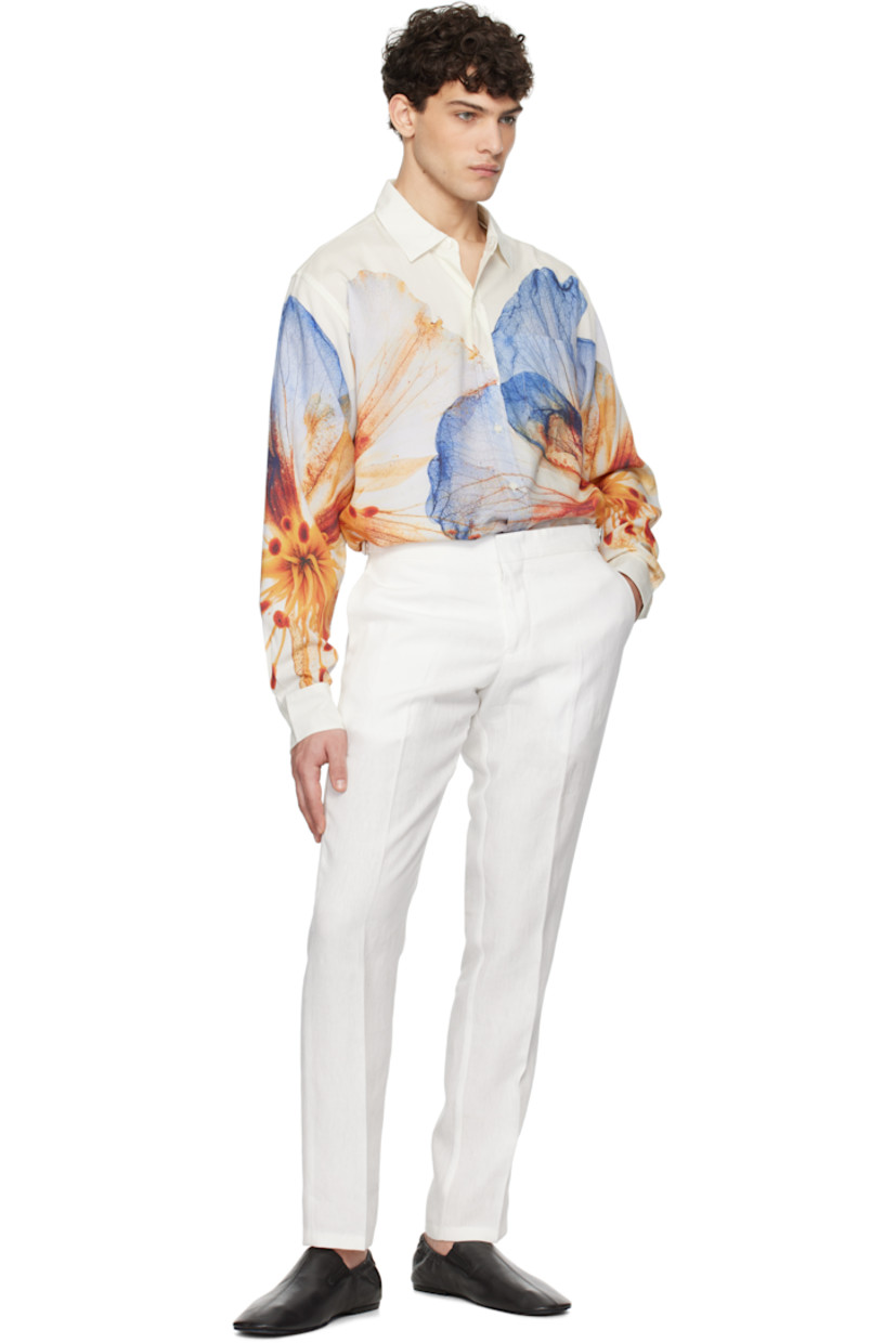 Tapered linen hopsack trousers. Moisture-wicking.

· Three-pocket styling
· Zip-fly
· Creased legs
· Cinch strap at waistband outseams

Supplier color: White sand