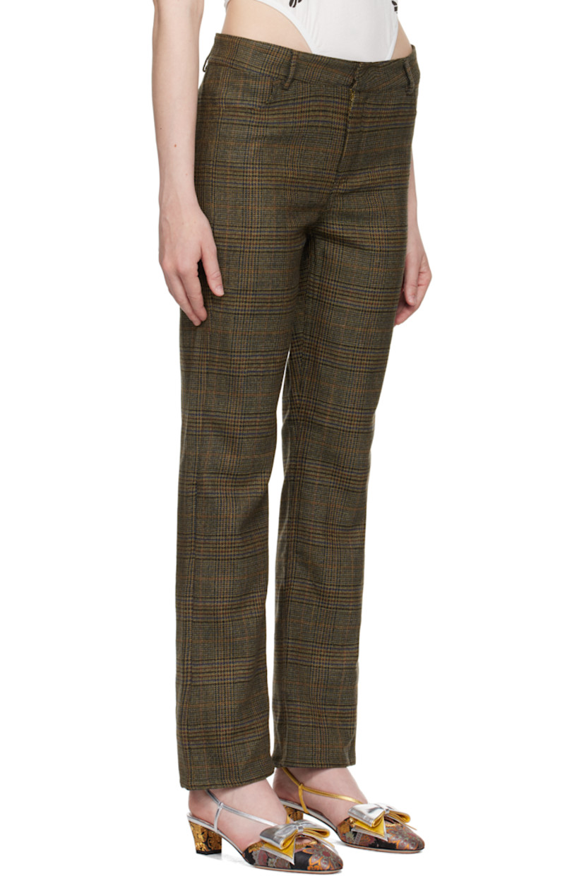 Wool delaine trousers. Prince of Wales pattern throughout.

· Belt loops
· Three-pocket styling
· Zip fly
· Full satin lining

Supplier color: Beige tartan