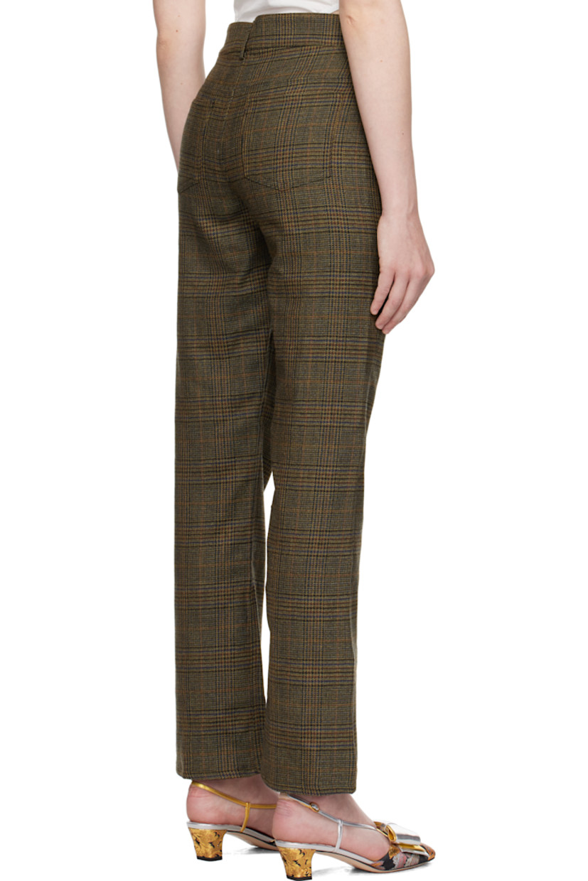 Wool delaine trousers. Prince of Wales pattern throughout.

· Belt loops
· Three-pocket styling
· Zip fly
· Full satin lining

Supplier color: Beige tartan