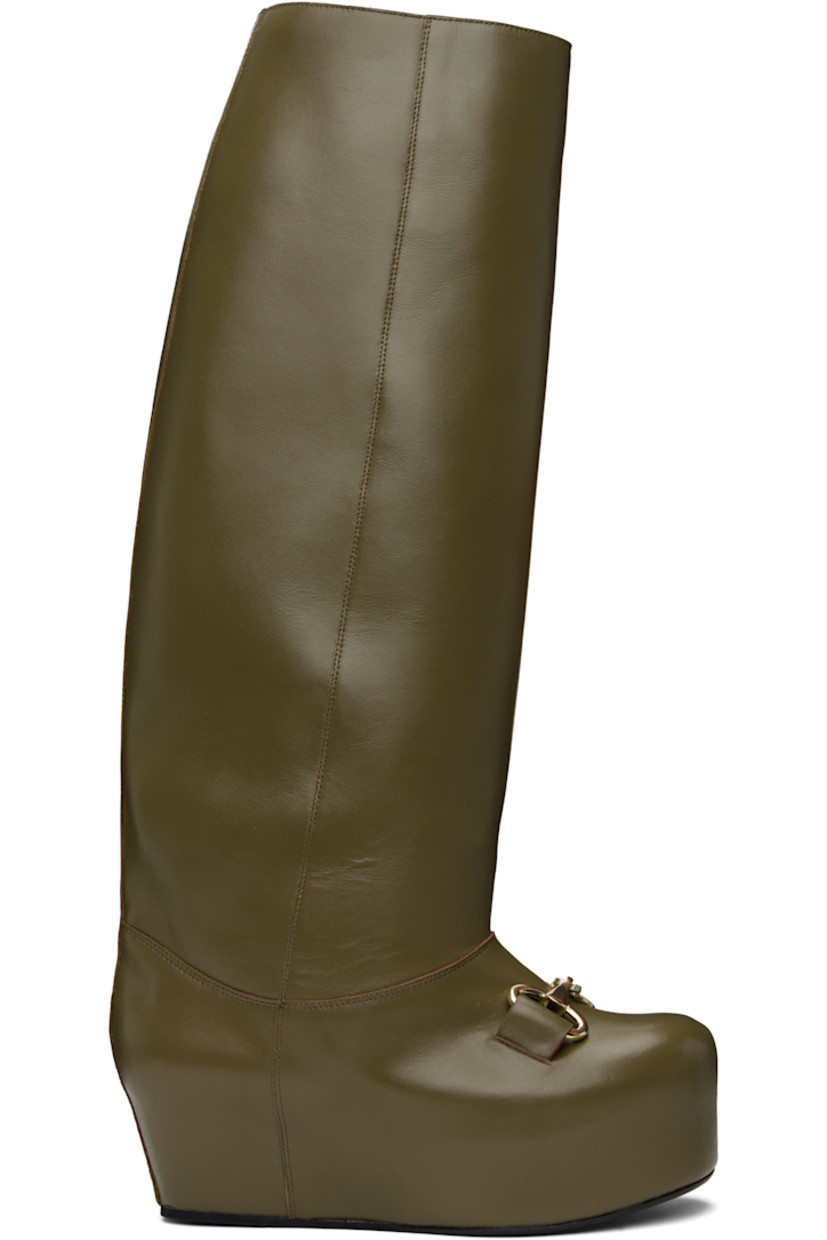Knee-high buffed calfskin boots in khaki.

· Horsebit hardware at vamp
· Concealed elasticized gusset at inner side
· Covered platform midsole
· Leather sole with rubber injection
· Platform: H2.5"

Supplier color: Olive