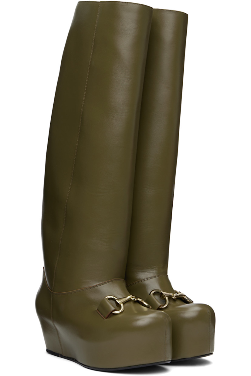 Knee-high buffed calfskin boots in khaki.

· Horsebit hardware at vamp
· Concealed elasticized gusset at inner side
· Covered platform midsole
· Leather sole with rubber injection
· Platform: H2.5"

Supplier color: Olive