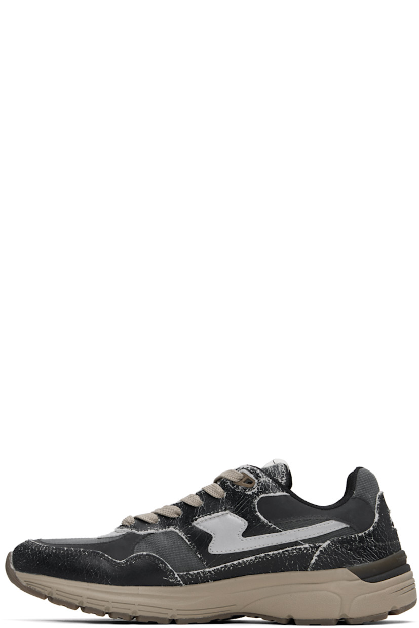 Low-top Geo-Merged® leather and CORDURA® canvas sneakers in black and gray. Distressing throughout.

· Logo embossed at toe
· Lace-up closure
· Logo patch at tongue
· Padded collar
· Text printed at outer side
· Inset logo patch at heel
· Logo embossed at heel counter
· Mesh lining
· Textured foam rubber midsole
· Treaded rubber sole

Supplier color: Cordura black