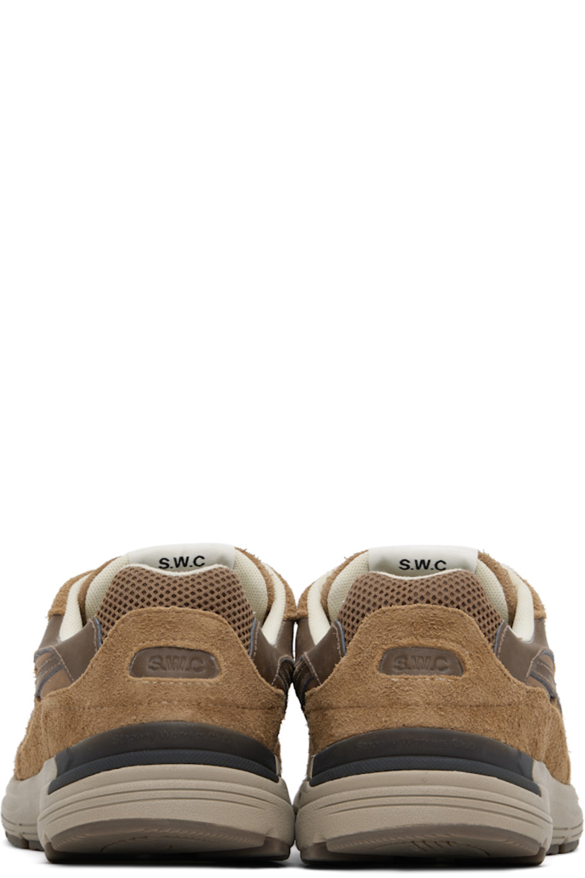 Low-top Geo-Merged® suede and mesh sneakers in brown.

· Logo embossed at toe
· Lace-up closure
· Logo patch at tongue
· Padded collar
· Text printed at outer side
· Logo embossed at heel counter
· Mesh lining
· Textured foam rubber midsole
· Treaded rubber sole

Supplier color: Brown