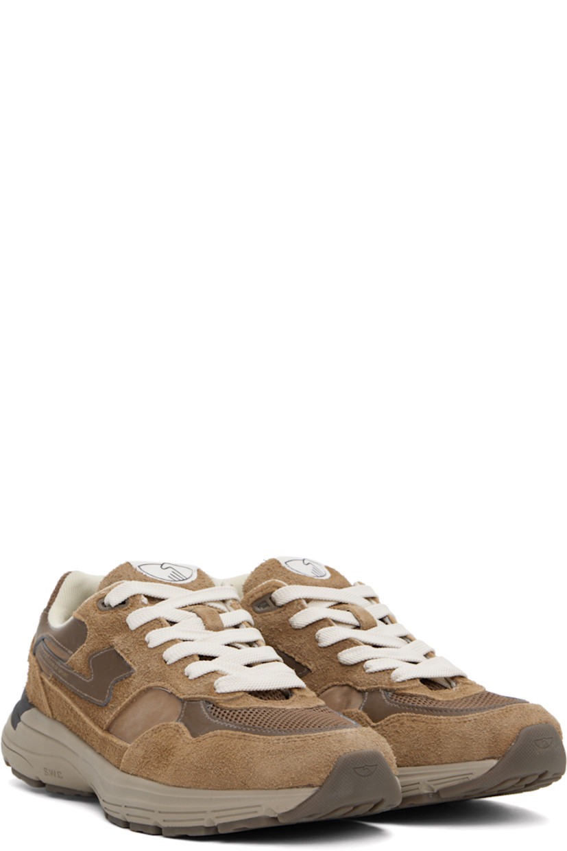 Low-top Geo-Merged® suede and mesh sneakers in brown.

· Logo embossed at toe
· Lace-up closure
· Logo patch at tongue
· Padded collar
· Text printed at outer side
· Logo embossed at heel counter
· Mesh lining
· Textured foam rubber midsole
· Treaded rubber sole

Supplier color: Brown