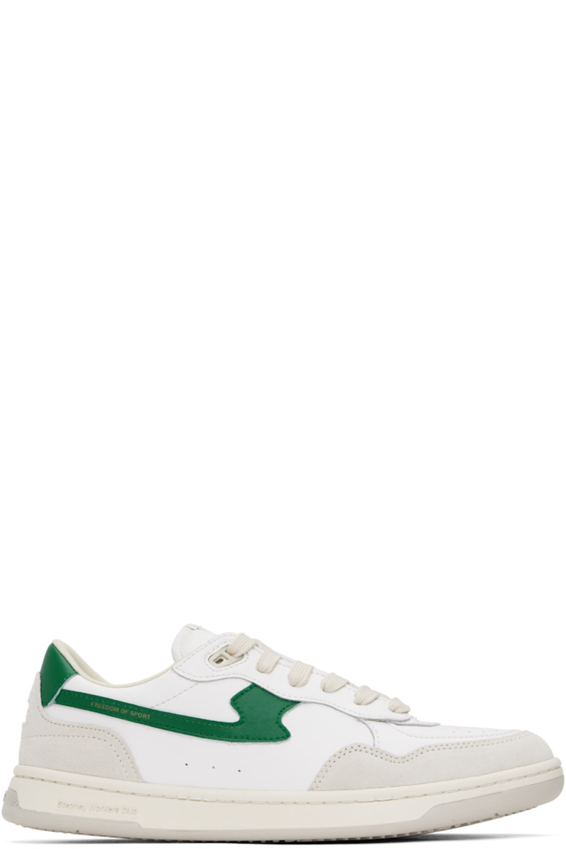 Low-top buffed leather and suede sneakers in white.

· Perforated detailing at toe
· Lace-up closure
· Logo patch at tongue
· Padded collar
· Text printed at outer side and heel
· Logo embossed at midsole
· Mesh lining
· Treaded rubber sole

Supplier color: White/Green