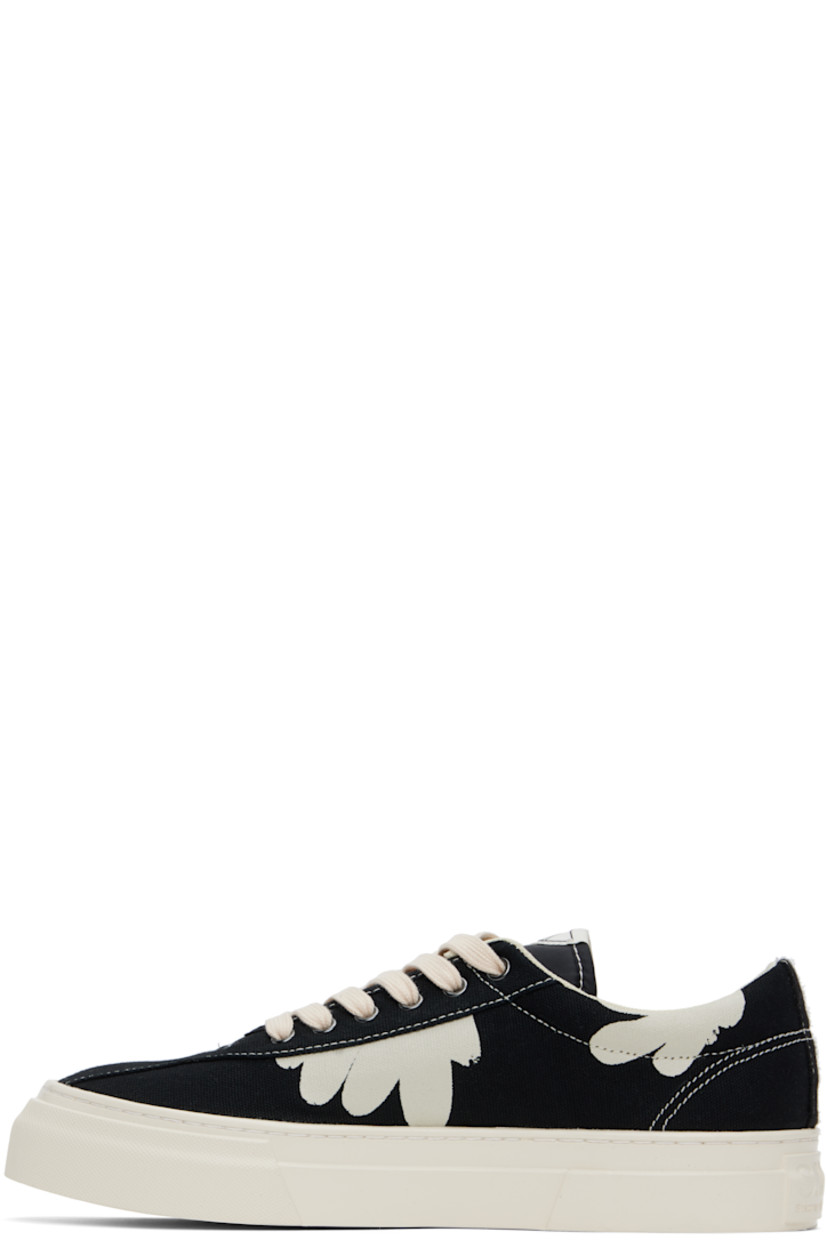 Low-top canvas sneakers in black and white.

· Lace-up closure
· Logo patch at padded tongue
· Padded collar
· Graphics printed at sides 
· Mesh lining
· Logo embossed at midsole 
· Treaded rubber sole
· Contrast stitching in white

Supplier color: Black/White