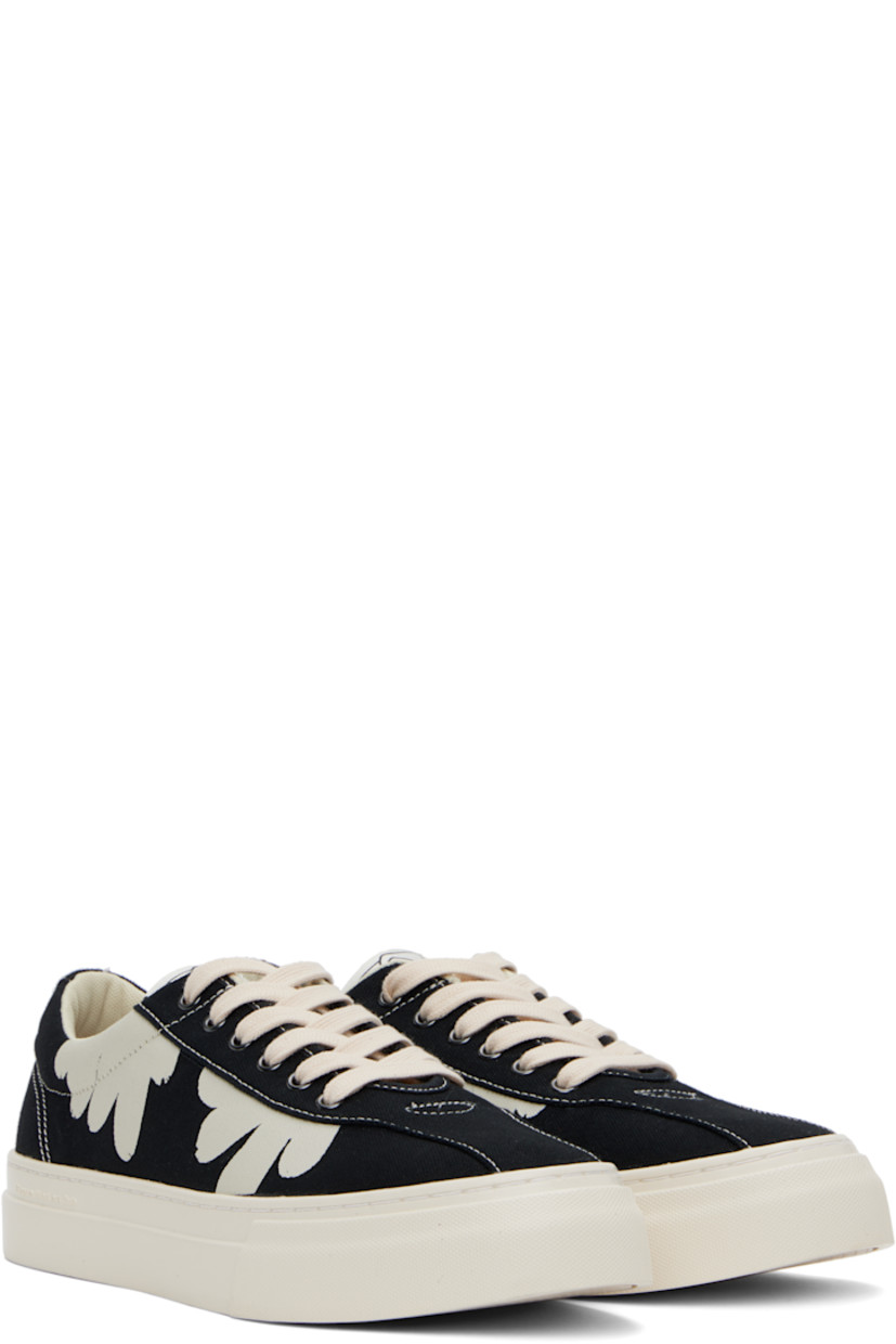Low-top canvas sneakers in black and white.

· Lace-up closure
· Logo patch at padded tongue
· Padded collar
· Graphics printed at sides 
· Mesh lining
· Logo embossed at midsole 
· Treaded rubber sole
· Contrast stitching in white

Supplier color: Black/White