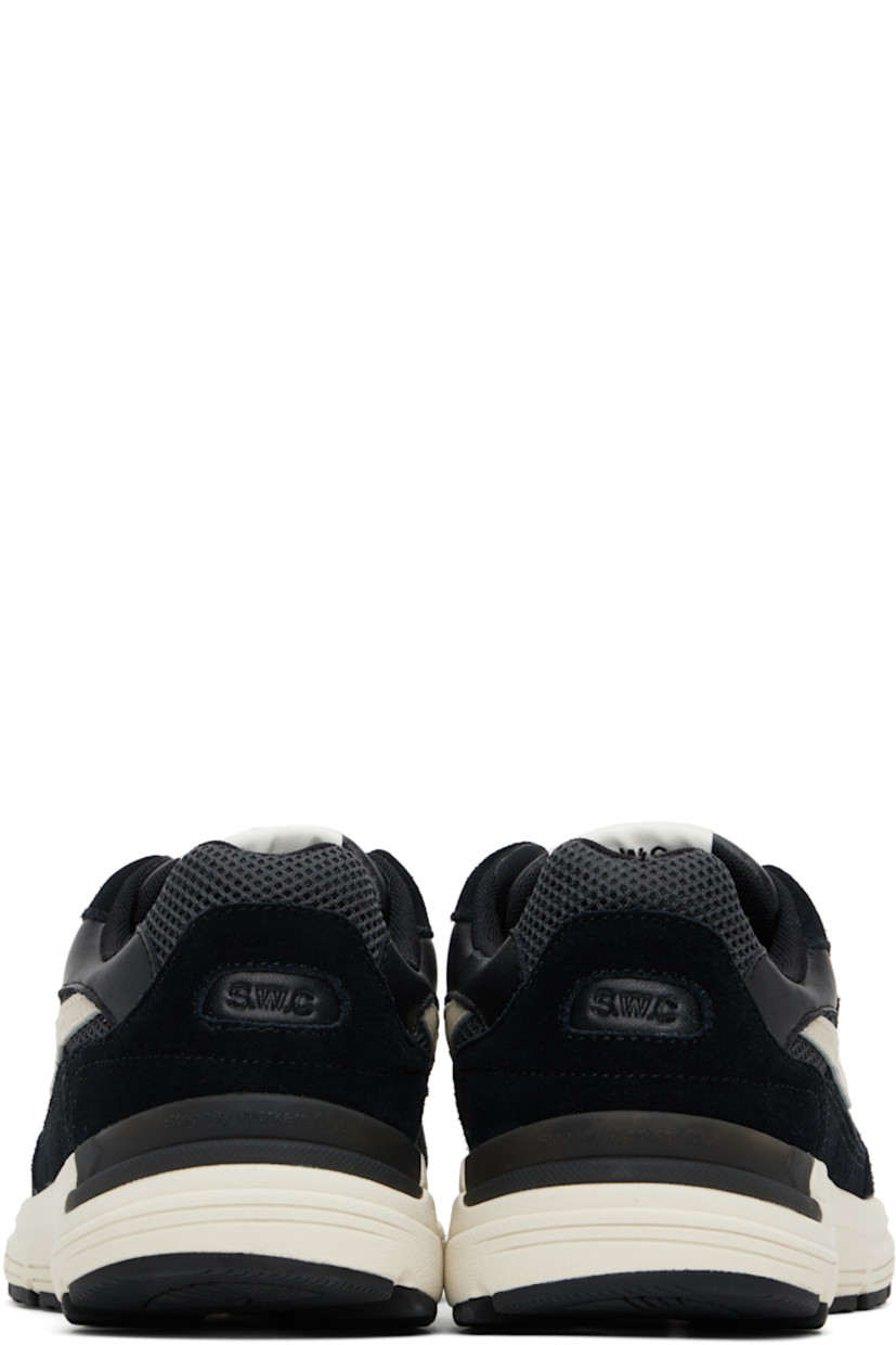 Lightweight low-top suede and mesh sneakers in black.

· Logo embossed at toe
· Lace-up closure
· Logo patch at tongue
· Padded collar
· Text printed at outer side
· Logo embossed at heel counter
· Mesh lining
· Textured foam rubber midsole
· Treaded rubber sole

Supplier color: Black
