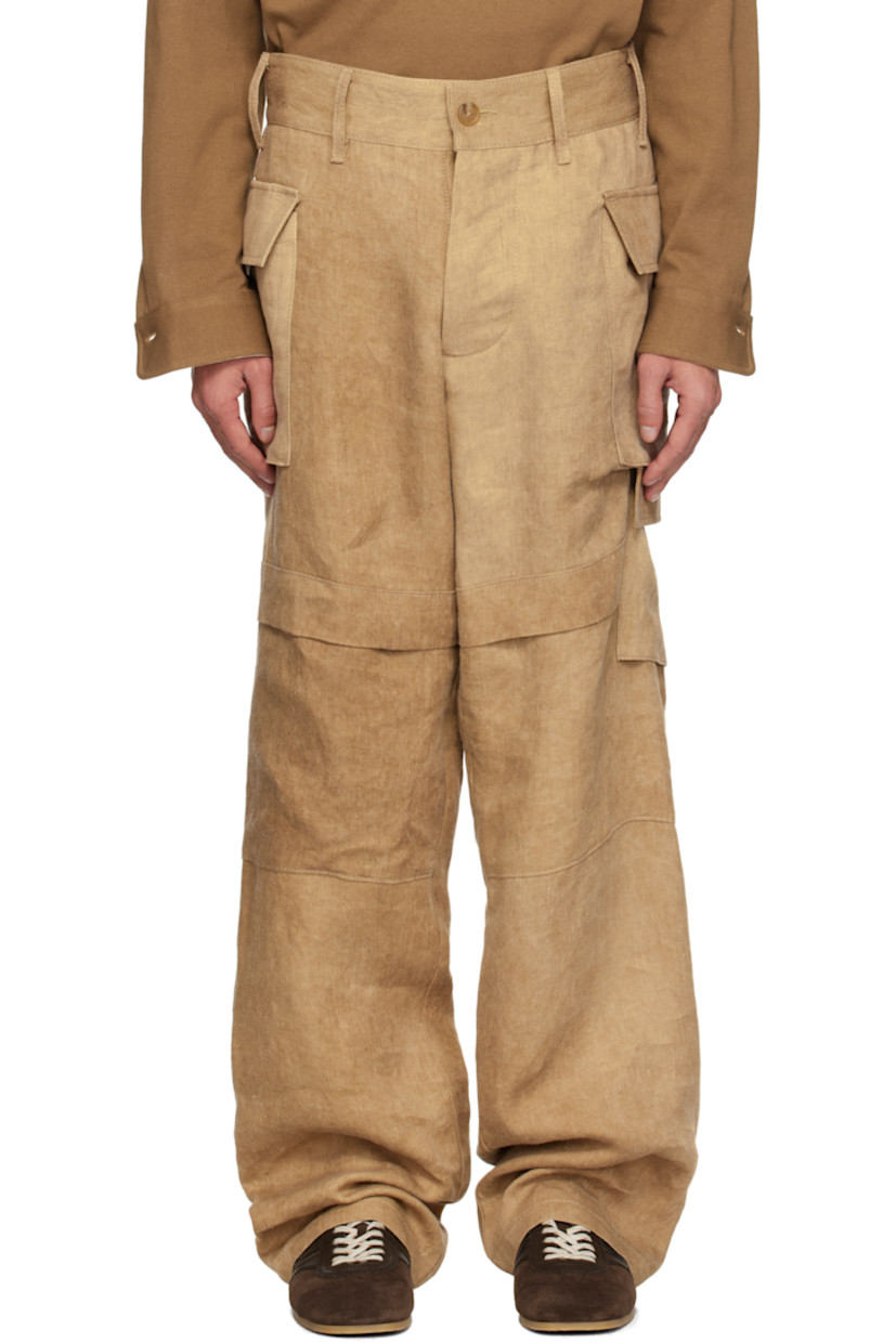 Washed linen twill cargo pants. Fading throughout. 

· Paneled construction
· Belt loops
· Button fly
· Flap at legs
· Flap pockets
· Horn hardware

Supplier color: Hard wash beige