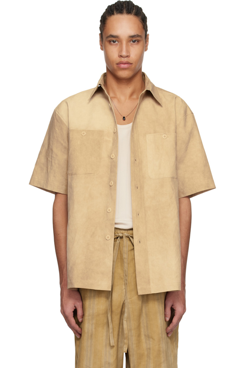 Washed linen- and cotton-blend twill shirt. Fading throughout. 

· Boxy-fit
· Spread collar
· Button closure
· Patch pockets
· Vented side seams 
· Dropped shoulders
· Box pleat at back yoke
· Corozo hardware

Supplier color: Wash light brown